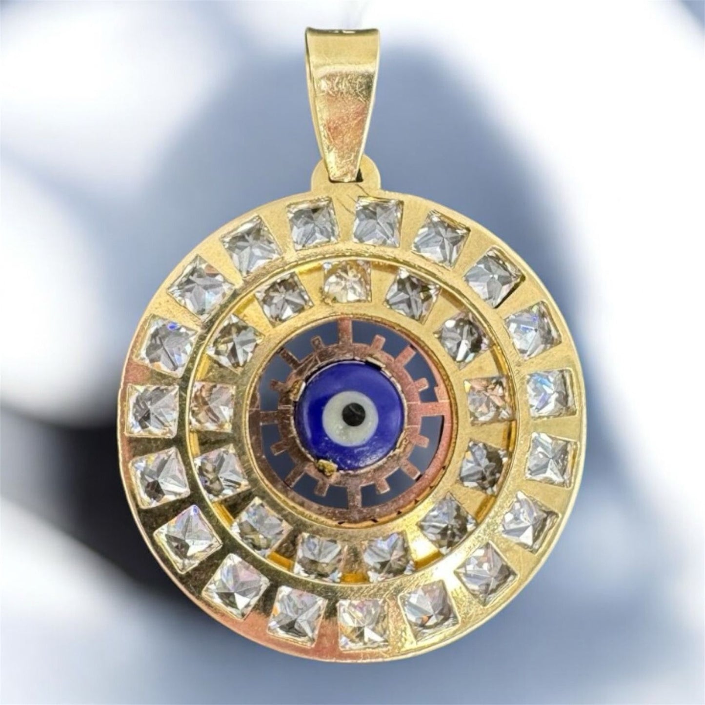 Compass pendant with Turkish eye in 10K Mexican gold