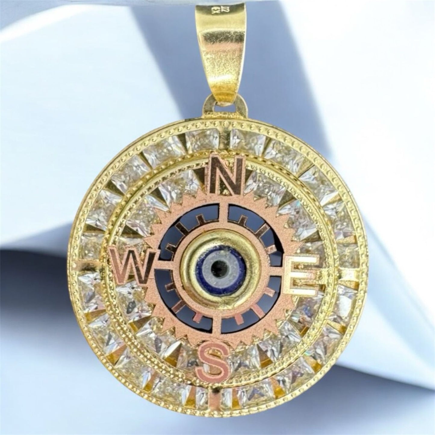 Compass pendant with Turkish eye in 10K Mexican gold