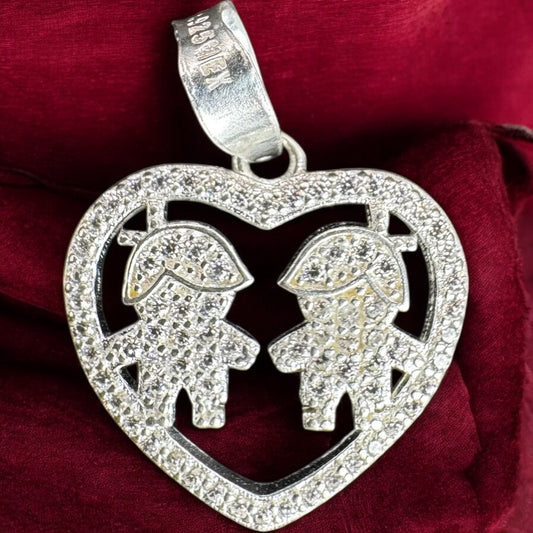 DIJE DE 2 NIÑOS EN PLATA MEXICANA .925