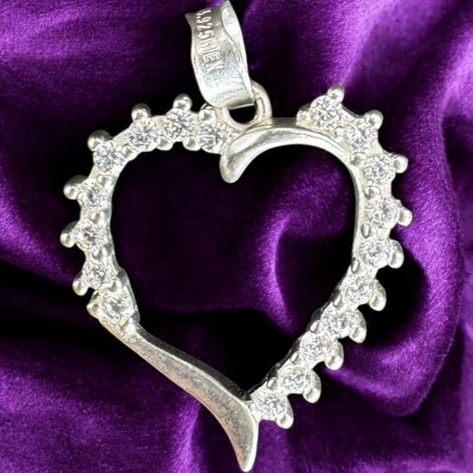 DIJE SILUETA DE CORAZON EN PLATA MEXICANA .925