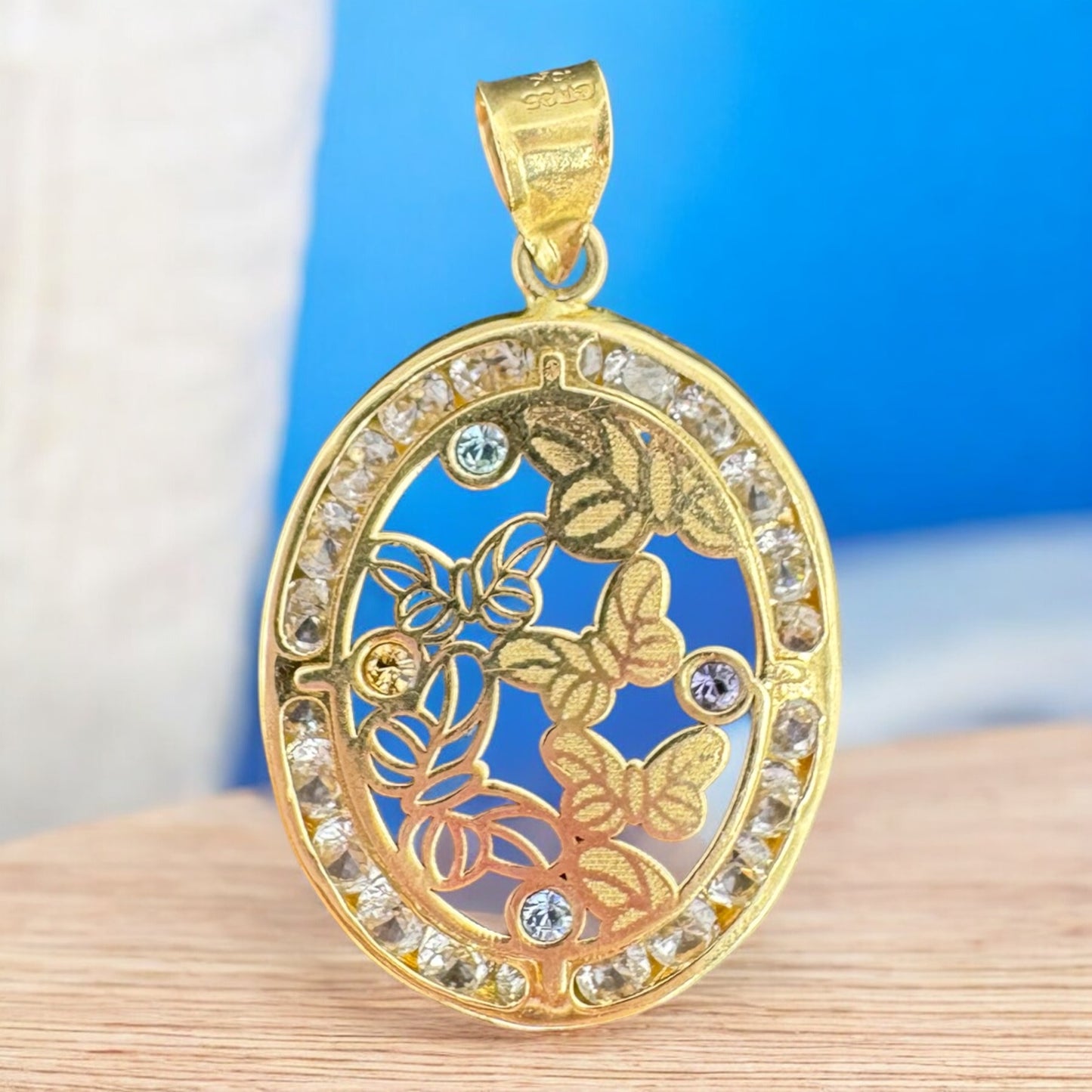 DIJE OVAL DE MARIPOSAS EN ORO MEXICANO 10 K