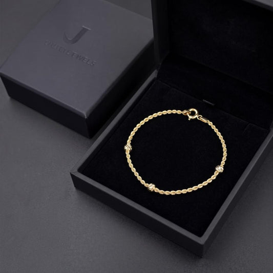 PULSO TORSAL CON BOLITAS EN ORO 14 K