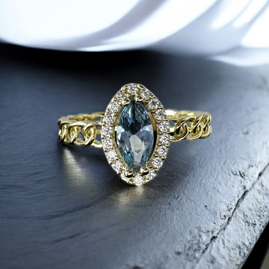 ANILLO PARA DAMA ESLABON CHINO CON PIEDRA AZUL EN ORO 10 K